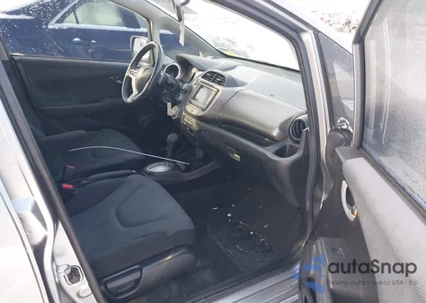 2009 Honda Fit Sport из США, поврежденный, VIN JHMGE886X9S024281